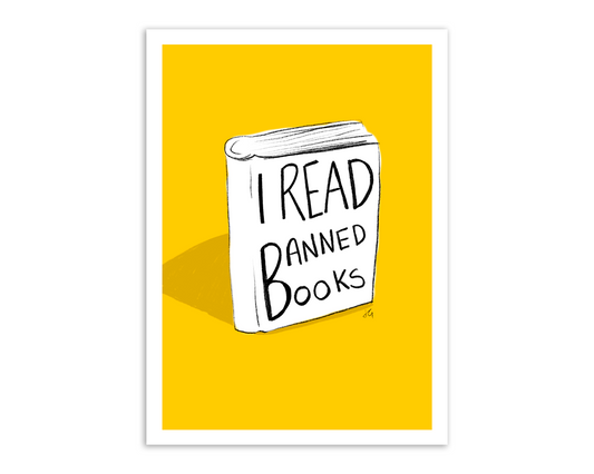 A sticker that has, I read banned books written on a illustrated book with a yellow background