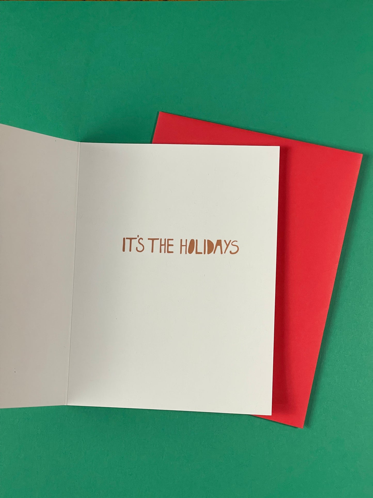 holiday greeting card with gingerbread that reads oh snap on the front and its the holidays inside.