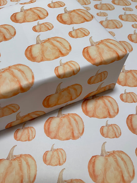 Watercolor pumpkins on wrapping paper