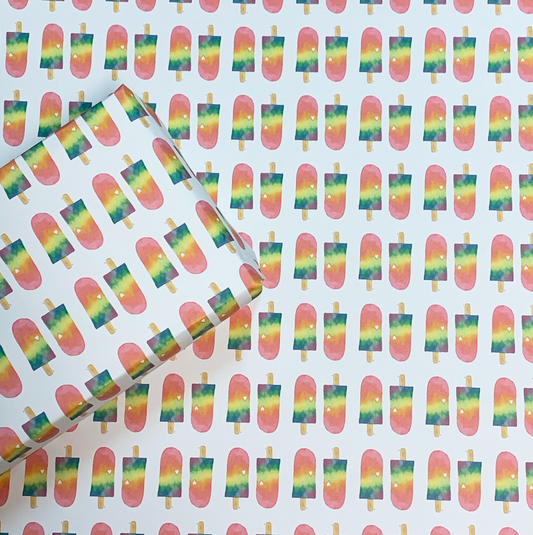 Wrapping paper with a rainbow popsicle and a heart