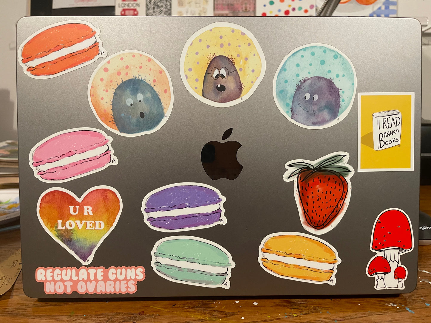a laptop with varying stickers