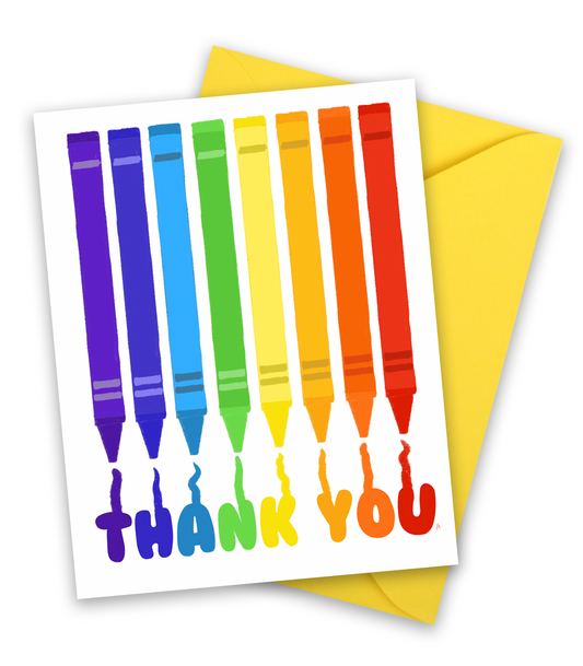 Greeting card with multiple crayons in rainbow shade that reads thank you. blank inside