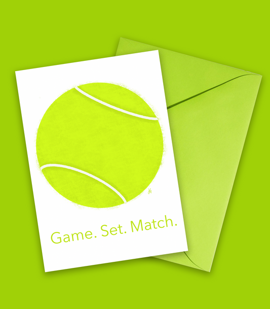Greeting card with a tennis ball that reads game, set, match. Blank inside