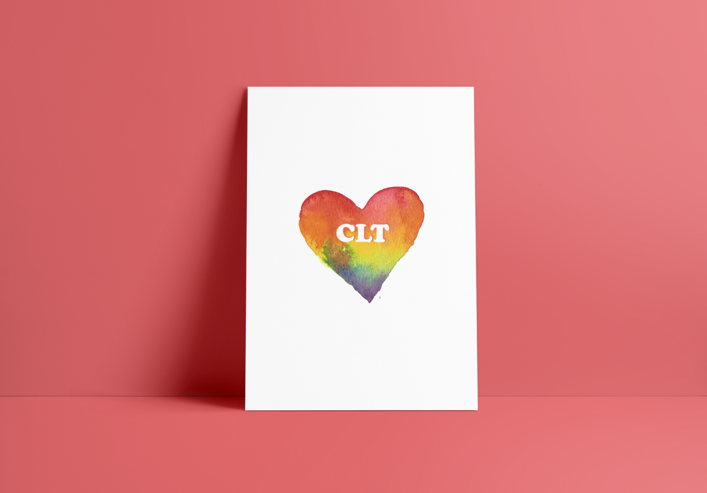 heart shape with a rainbow gradient, words CLT in the middle which stands for the city Charlotte, greeting card, blank inside
